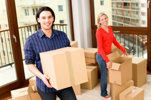 Skilled team handling delicate items during unpacking